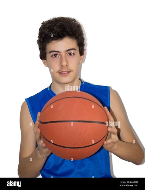 Young Boy Playing Basketball In A Isolated Background Stock Photo Alamy