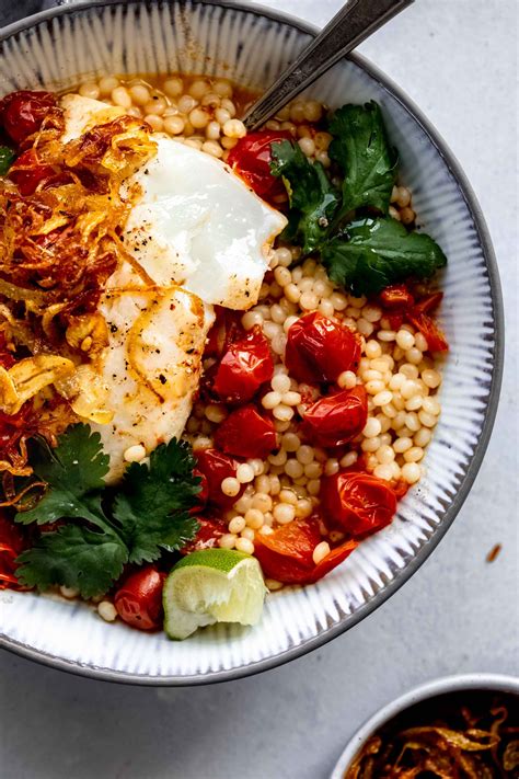 Season to taste with salt and pepper. Poached Fish with Tomato Couscous | Poached fish recipes ...
