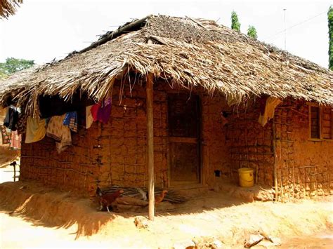 Thatch And Reinforced Mud House Typical Of The Rural Areas Around