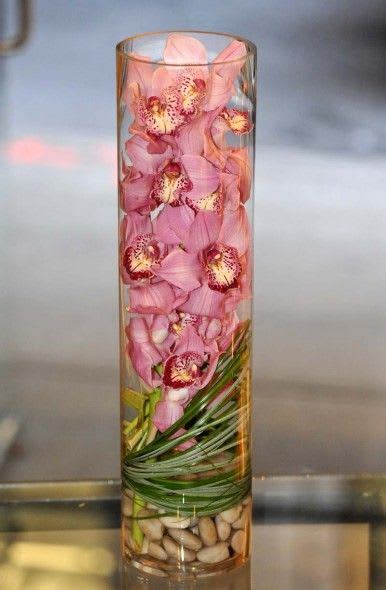 Cymbidium Orchids In Cylinder Vase