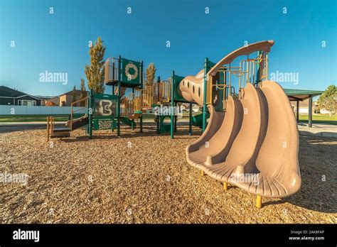 Unusual Triple Slide In A Kids Playground Stock Photo Alamy