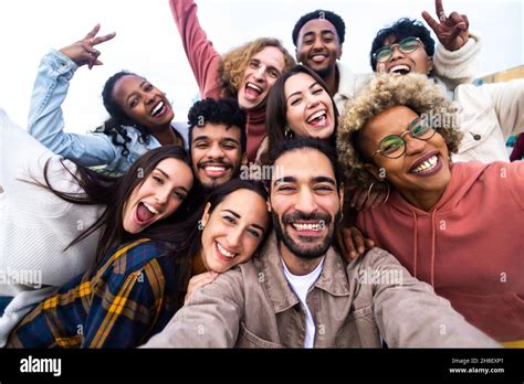 Big Group Portrait Of Diverse Young People Together Outdoors Stock