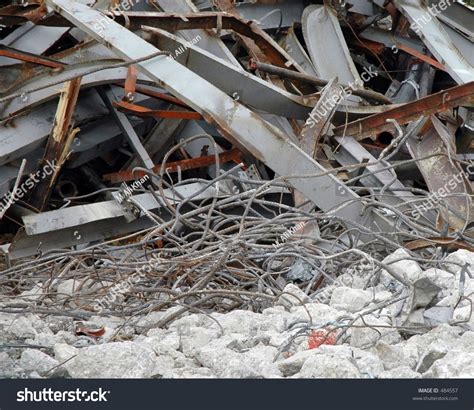 Pile Of Rubble From Demolished Building Containing Twisted Steel And