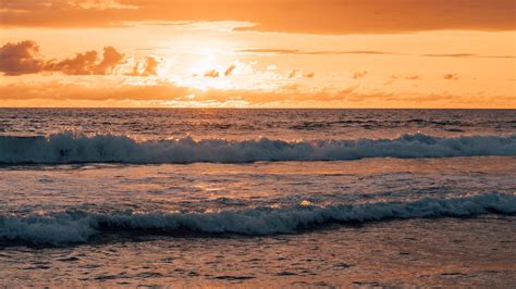 Download Wallpaper 1920x1080 Sunset Sea Waves Beach Full Hd Hdtv Fhd 1080p Hd Background