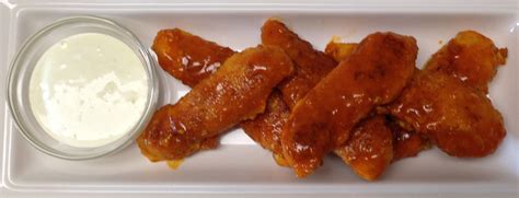 These Buffalo Wings Are Boneless Crunchy And Dripping In Wing Sauce