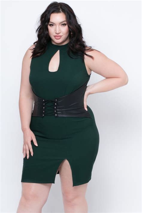 This Plus Size Stretch Knit Dress Features A Crew Neckline A Front