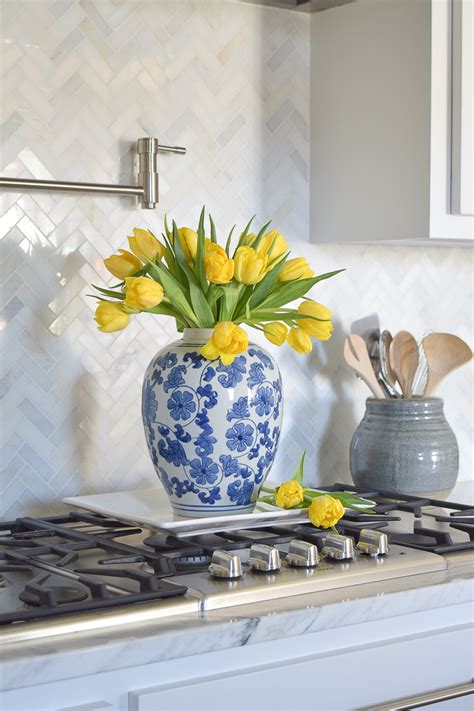 Yellow flowers that look like tulips. A Kitchen Backsplash Transformation + A Design Decision ...