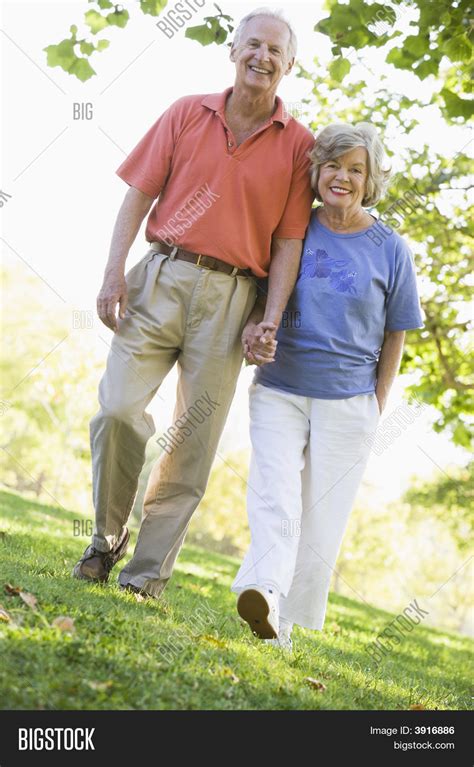 Senior Couple Walking Image And Photo Free Trial Bigstock