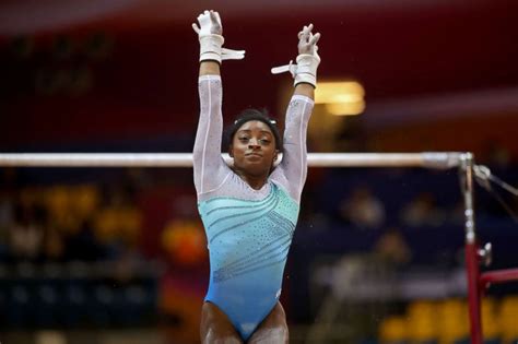 simone biles makes history as 1st woman to win 4 all around world titles abc news