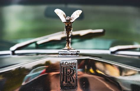 Check spelling or type a new query. silver Rolls Royce emblem photo - Free Logo Image on Unsplash