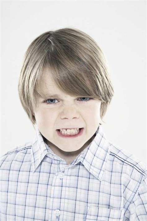 Boy Clenching Teeth Close Up Portrait Stock Photo