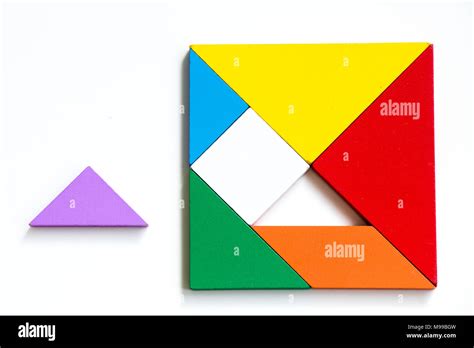 Colorful Wood Tangram Puzzle In Square Shape That Wait To Complete On