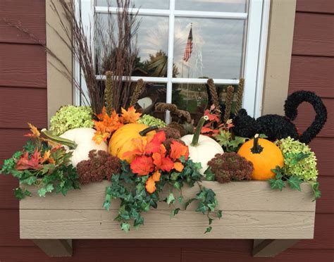 Change Into Fall With A Few Dried Flowers Added To Your Window Box
