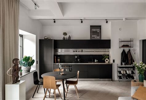 A tiny kitchen doesn't mean you need to forgo cooking and live off of takeout! Small modern apartment with black kitchen in Stockholm (51 sqm) 〛 Photos Ideas Design