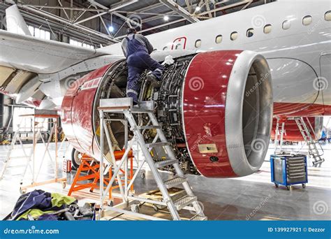 Aviation Industry Mechanic Repairs Aircraft Engine Jet Stock Image