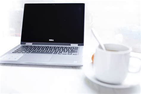 It can be tough to avoid. Free photo: Dell Laptop in Front of Cup of Coffee - Blur ...