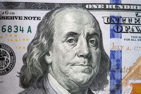 Benjamin Franklin Portrait On 100 Dollar Banknote Closeup Stock Photo