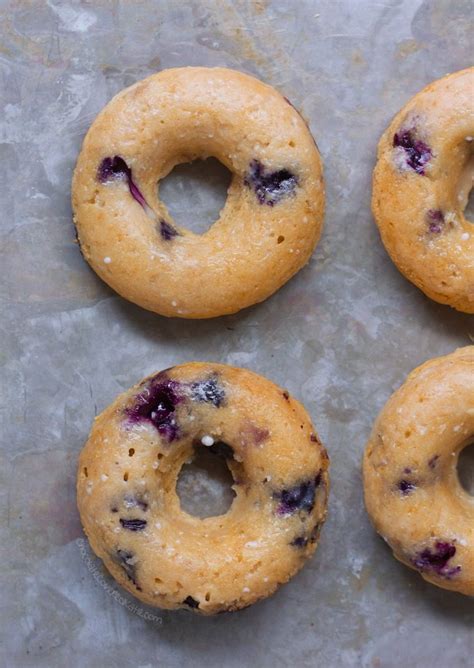 This baked donut recipe makes fluffy cake donuts and is incredibly easy to mix together. Blueberry Baked Donuts - Refined Sugar Free!