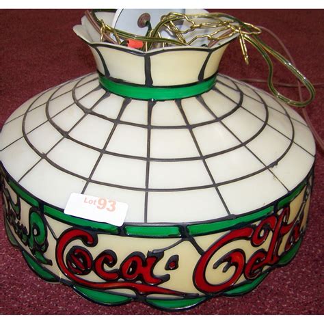 Tiffany lamps are considered part of the art nouveau movement. COCA-COLA TIFFANY STYLE PLASTIC LAMP SHADE