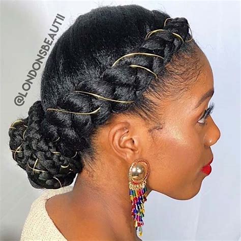 Black girls usually have thicker hair, that though as shown, in this style, the front part of the hair is swept sideways, and the back part is tied to make a bun with braids. 23 Beautiful Braided Updos for Black Hair | StayGlam