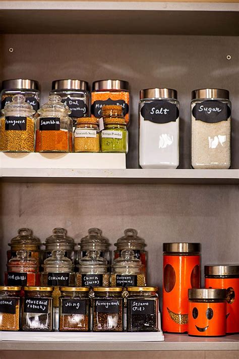 A rack of spices in matching jars adds a sense of calm to your pantry. how to organize Indian spice cabinet - Pantry Ideas - My ...