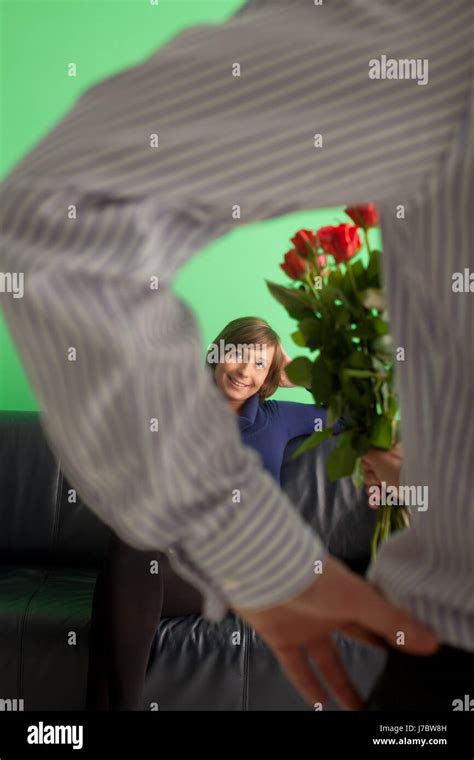 Man Gives A Woman Roses Stock Photo Alamy