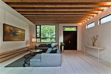 Ecological House In Montreal With Contemporary Exposed Beams