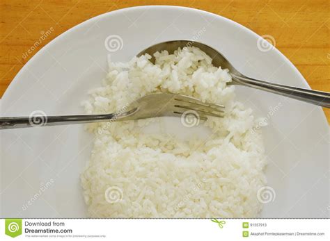 Spoon And Fork Scoop Rice From Plate For Eating Stock Image Image Of Support Spoon 91557913