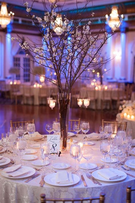 Whimsical Branch Centerpiece With Hanging Candles