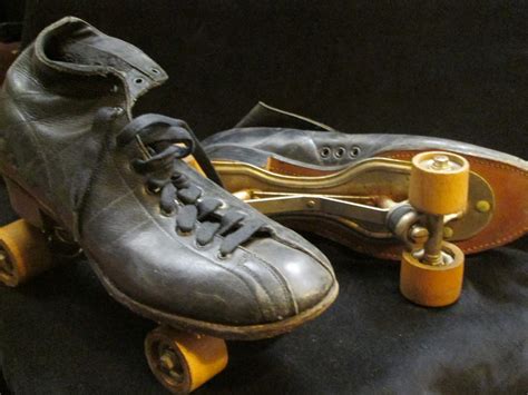 Uhuru Furniture And Collectibles Sold Vintage Roller Skates With Wooden