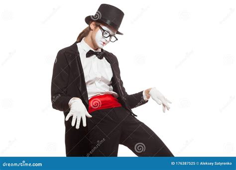 Portrait Of Male Mime Artist Performing Isolated On White Background