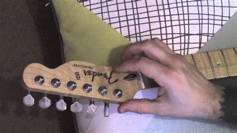 How To String Your Guitar So It Stays In Tune Guitar Set Up Tips