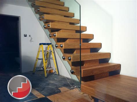 Contemporary oak and glass balustrade. X-Vision Oak Staircases | Contemporary Oak Staircase