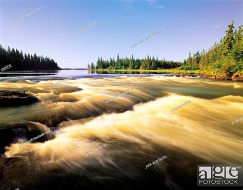 Rapids Along The Grass River Northern Manitoba Canada Stock Photo