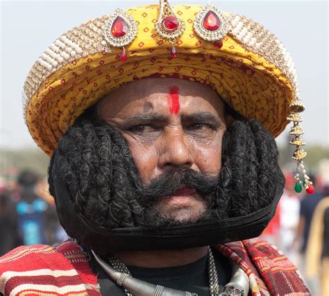 Indian Man With Long Mustache Poses For A Photo During Camel Festival In Rajasthan India