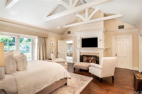 The fireplace demands no installation whatsoever, thus perfect for those who don't have any male house members or people not knowledgeable enough in fixing something. Traditional Master Bedroom with stone fireplace, Hardwood ...
