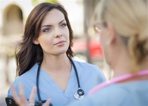 Nurses Talking Stock Photos Images And Backgrounds For Free Download