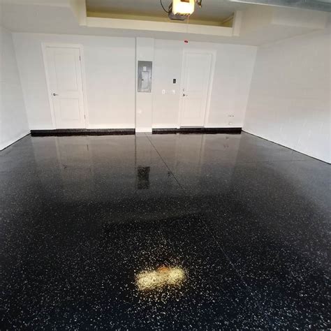 Painting a rug, painting concrete, painted garage floor. Black Metallic Flake Epoxy Garage Floor - CJ Garage Flooring