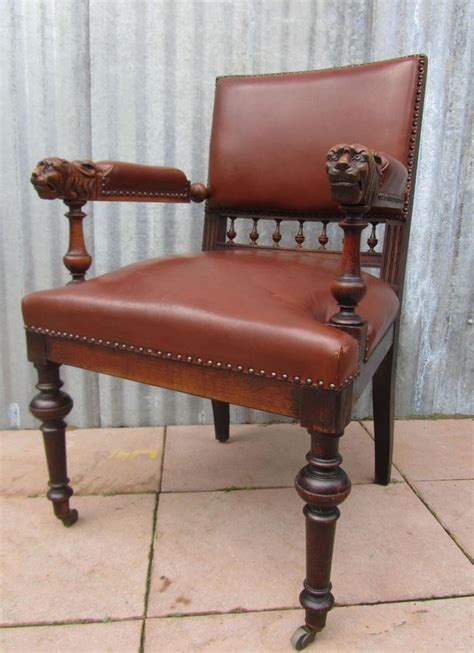 It was once part of a parlor set. Antique Dutch Carved Oak Lion Head Arm Chair for sale at ...