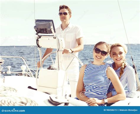 Group Of Happy Friends Traveling On A Yacht Tourism Vacation Stock