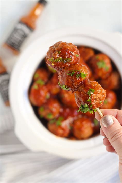 The crockpot keeps the meatballs and bourbon sauce warm but, you can transfer them to a serving tray or plate. Slow Cooker Bourbon Whiskey BBQ Meatballs | Midwest Foodie
