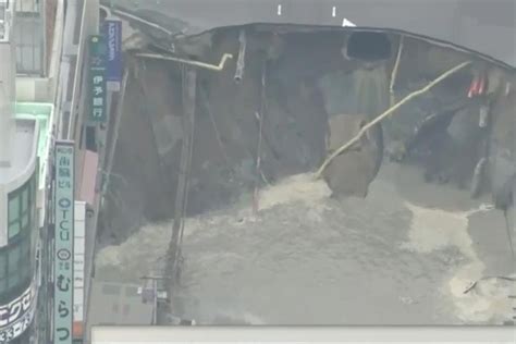 Massive Sinkhole Swallows Street In Japan Upi