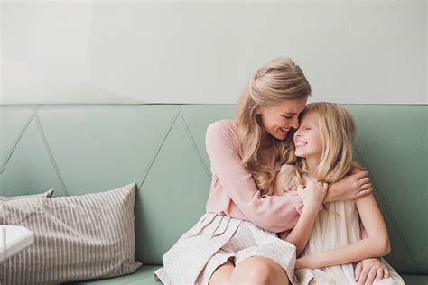 Mother And Daughter Cuddling By Stocksy Contributor Lumina Stocksy