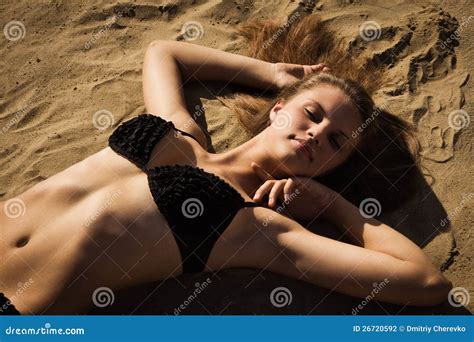 Attractive Girl Relaxing On A Sandy Beach Stock Photo Image Of Sand