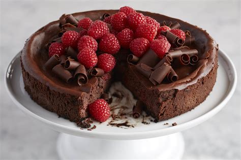 Oreo cookie crust with a raspberry cheesecake filling, topped with raspberry sauce and whipped cream. Decadent Chocolate Raspberry Cheesecake