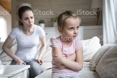 Angry Mother Scolding Little Sad Preschool Daughter Stock Photo