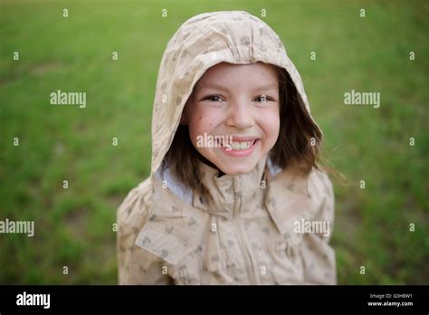 The Ridiculous Little Girl Looks In A Camera And Smiles The Girl On