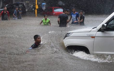 Heavy rainfall disrupts daily lives in mahanagari. Mumbai rains LIVE: 5 dead in metropolis, 4 washed away in ...