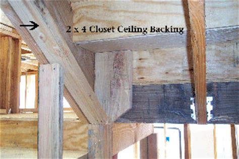 Score drywall on one side with utility knife, then apply pressure at the score line until the drywall snaps. Stair Closet Ceiling Backing