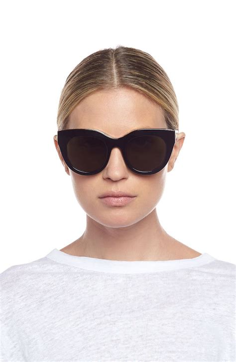 Bold Frames Accentuate The Retro Allure Of Lightweight Full Coverage Sunglasses Finished With